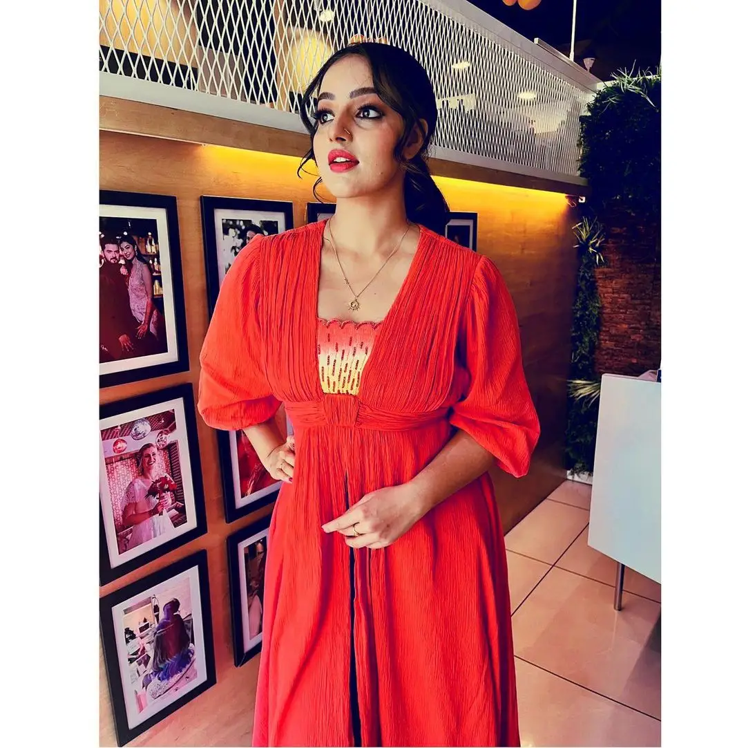 Malavika Menon In South Indian Traditional Orange Dress